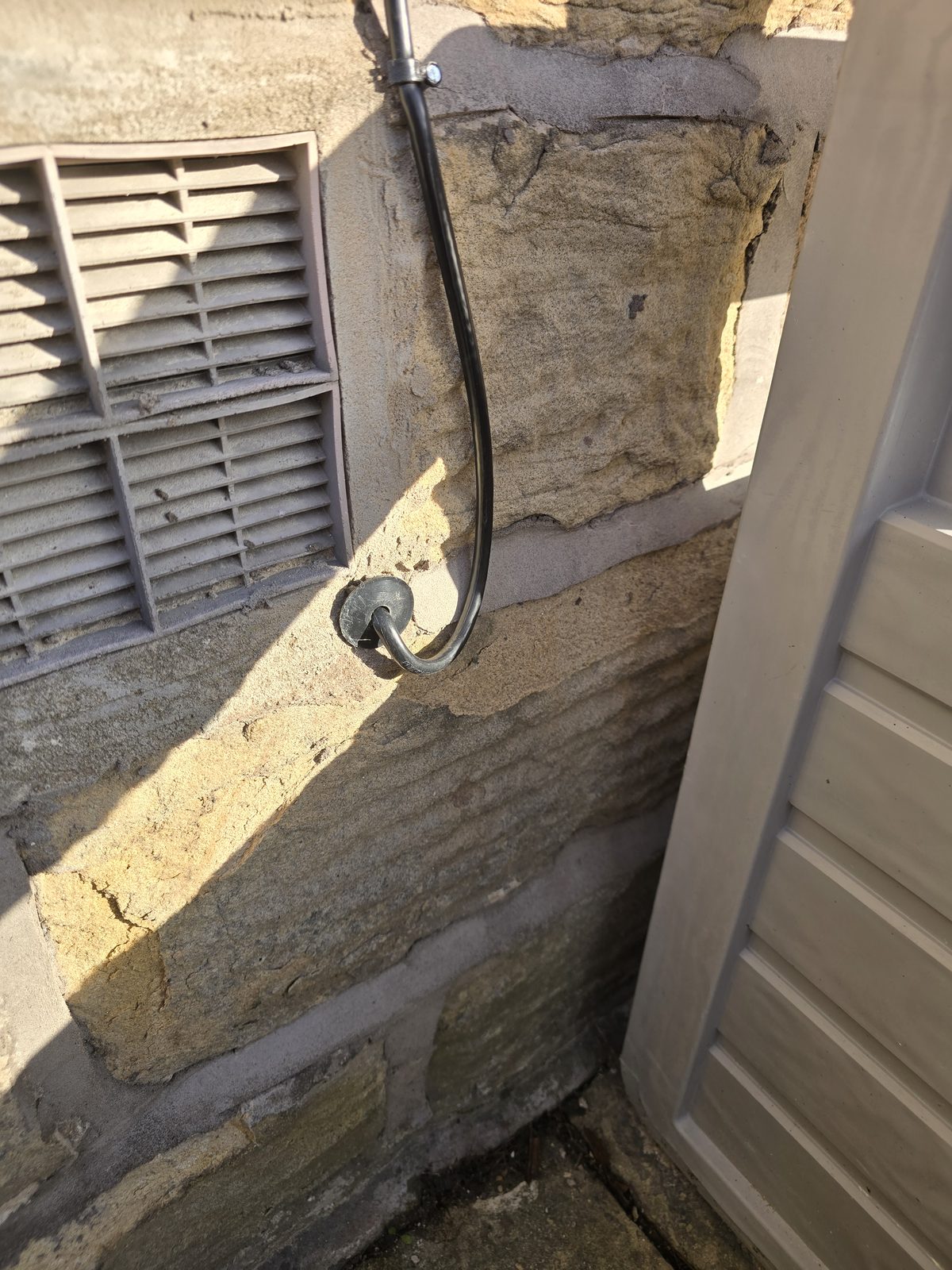 Aerial and satellite repair work in progress at a Stockport property