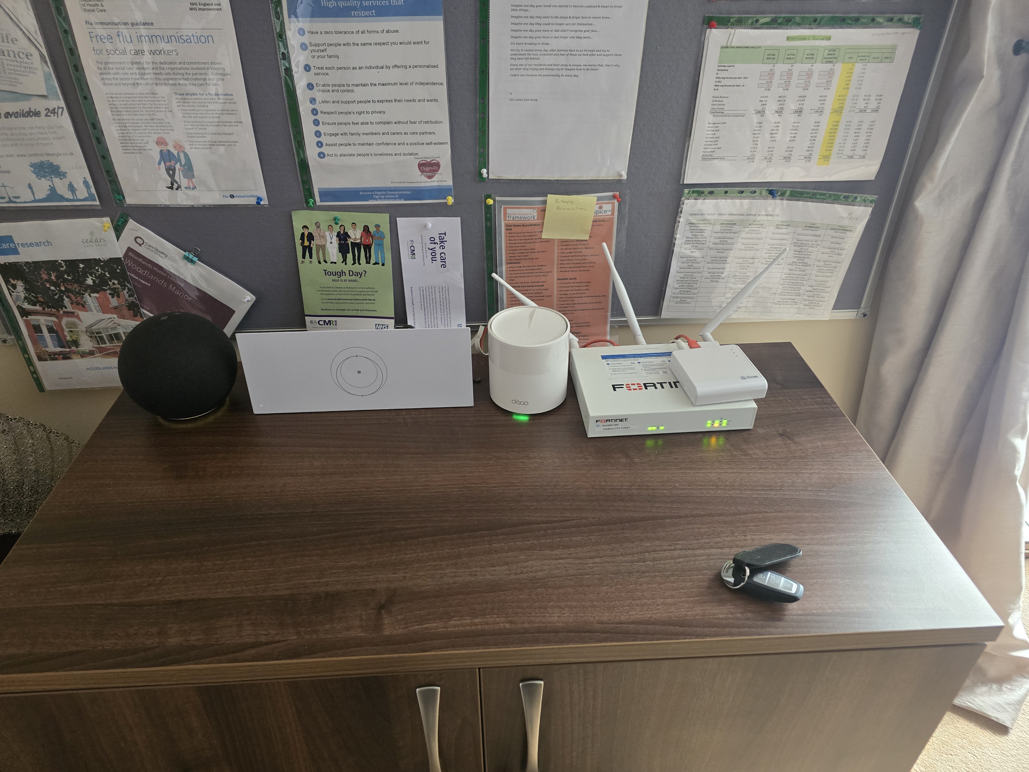 Office workspace served by the new WiFi and VoIP setup