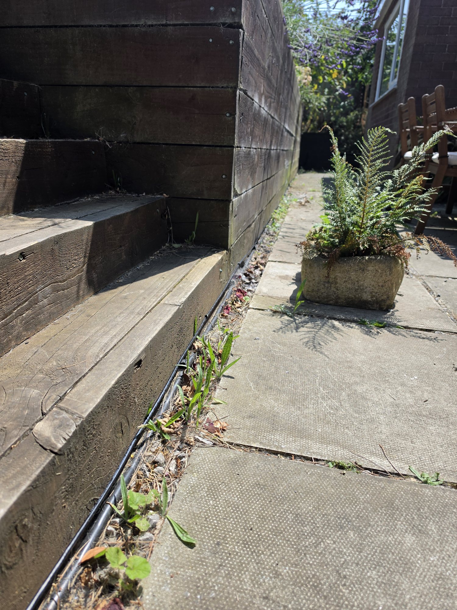 Discreet external Cat6 data cable route across a Stockport home