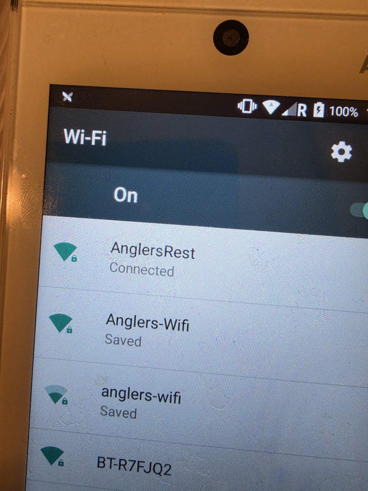 Engineer testing a Wi-Fi network in a UK property