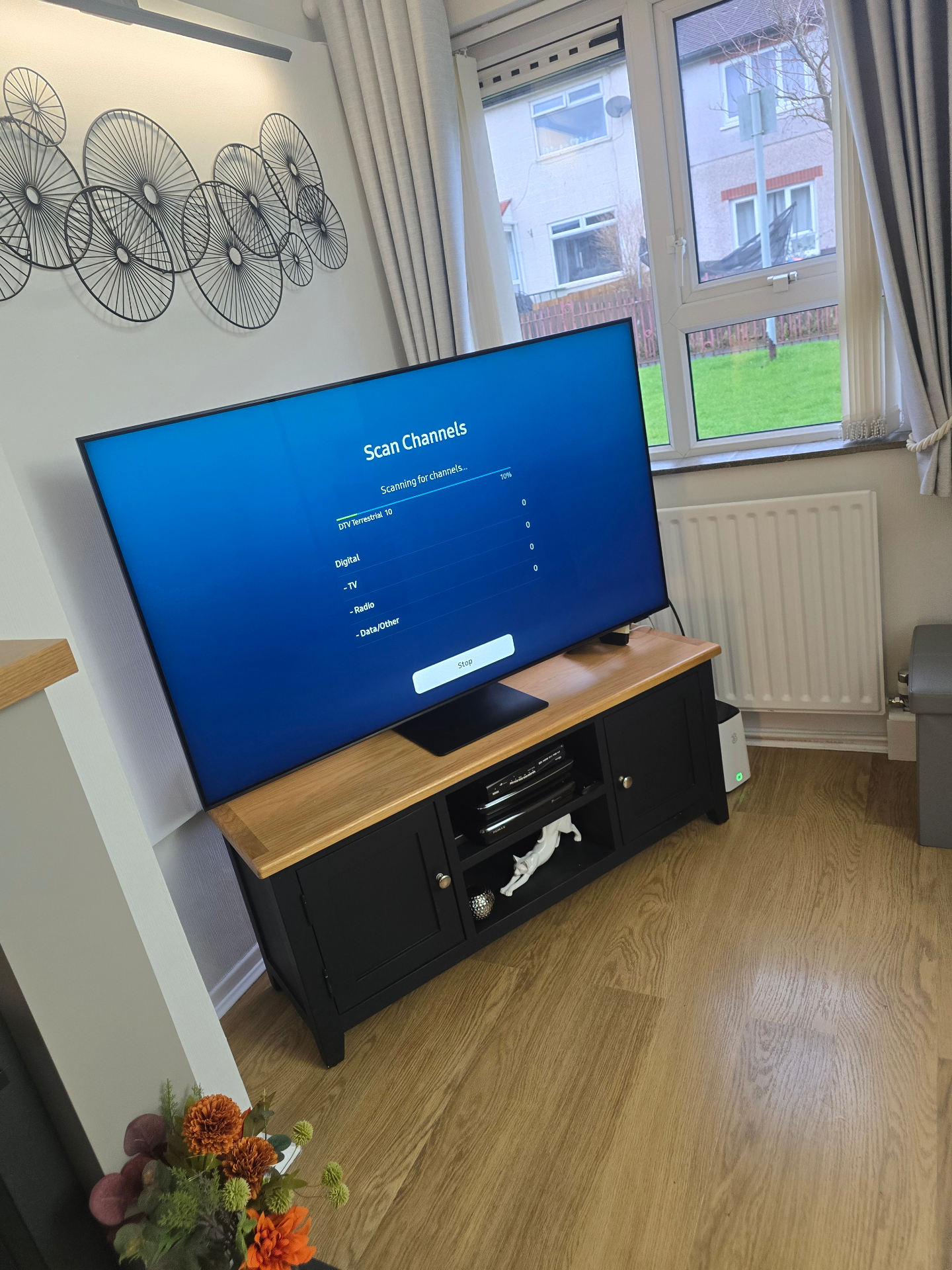 Engineer retuning a TV after a Winter Hill transmitter change