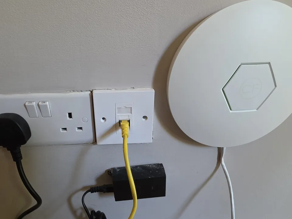 Wall data outlet and dedicated access point inside the Glossop garden office