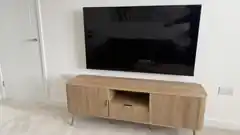 Finished wall-mounted TV installation completed by Evolution Data & Digital in Salford