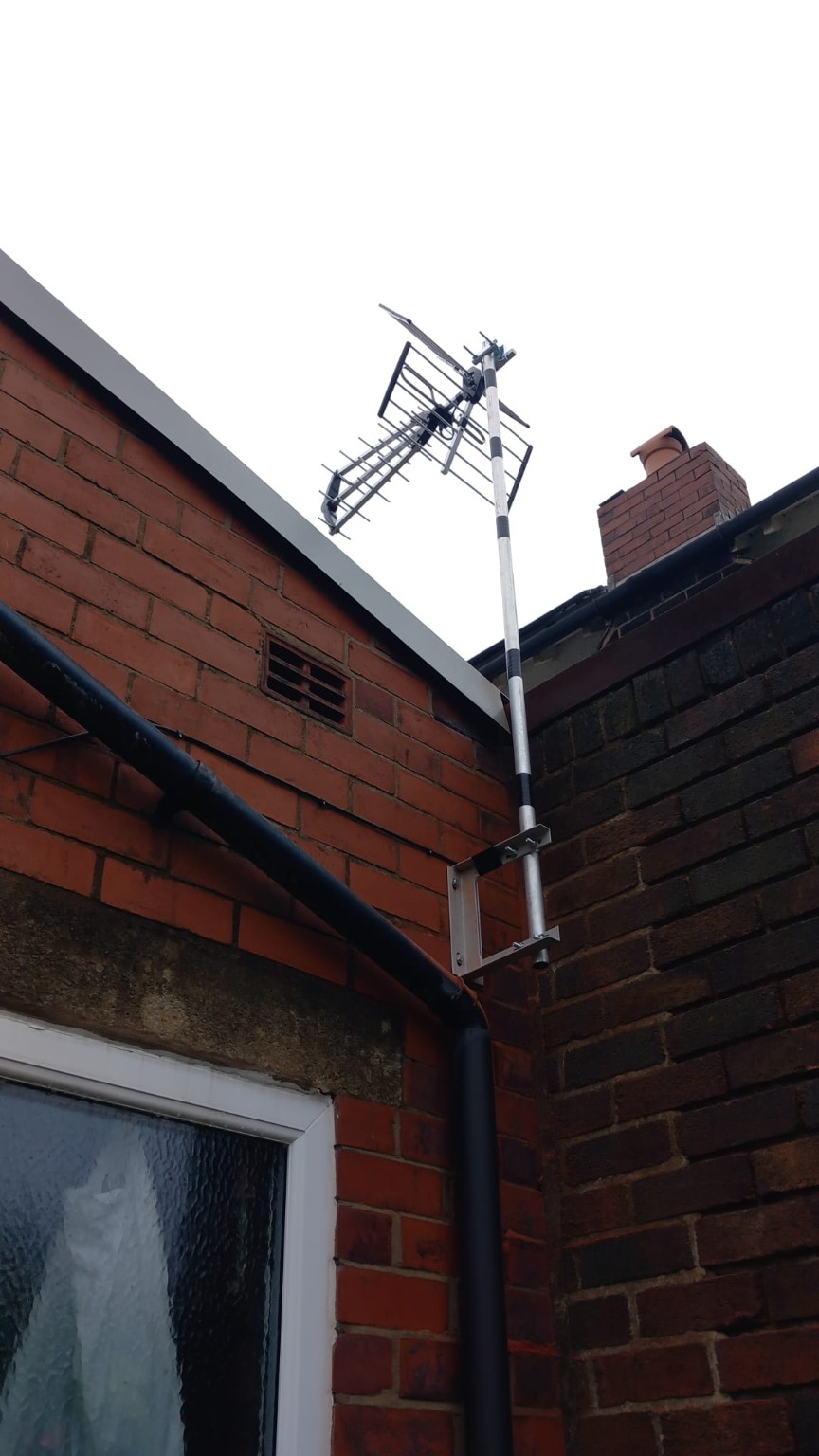 TV aerial mounted on a house in Stockport